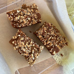 YOMO gluten free banana bread made in a square pan, gluten free banana bread with crunchy top, gluten free vegan banana bread