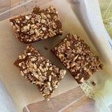 YOMO gluten free banana bread made in a square pan, gluten free banana bread with crunchy top, gluten free vegan banana bread