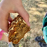 Eating YOMO gluten free banana bread on the go, best kids banana bread, wholefood banana bread, gluten free baking